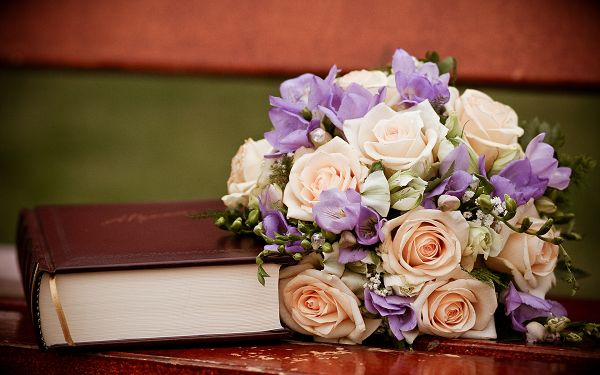 A Bouquet of Flower Next to a Thick Book, Book is Thus Smelling Good, Do Open and Read It More - HD Creative Wallpaper