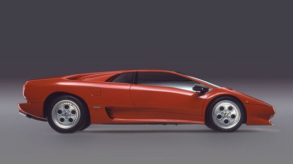 A Red Lamborghini Car on Grey Setting, Combined with Incredible and Perfect Lines, Speed Can be Unbeatable - Lamborghini Cars Wallpaper
