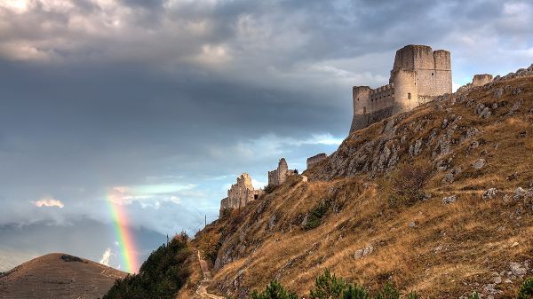 Beautiful Sceneries of the World - The Great Wall on the Hillside, a Rainbow Showing Up, the Sky is Still Cloudy