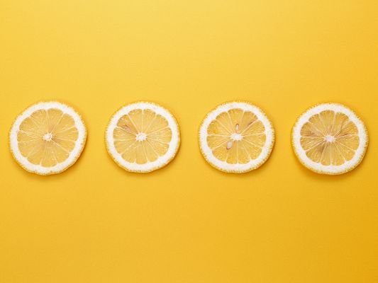Cute Fruits Wallpaper, 4 Lemons in a Line, Yellow Background, Incredible Scene
