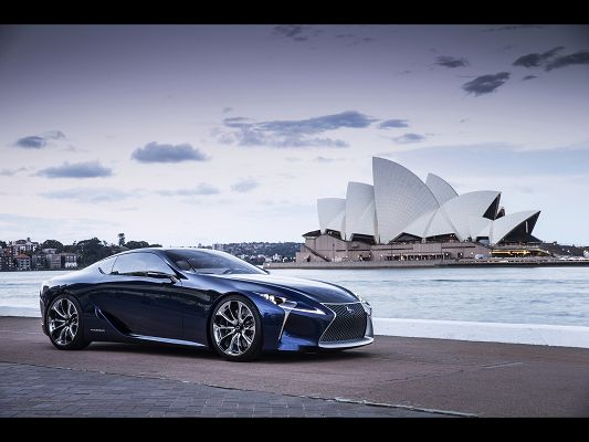 Image of Cars - A Blue Lexus Car by Seaside, the Blue Sky, Combine an Incredible Scene