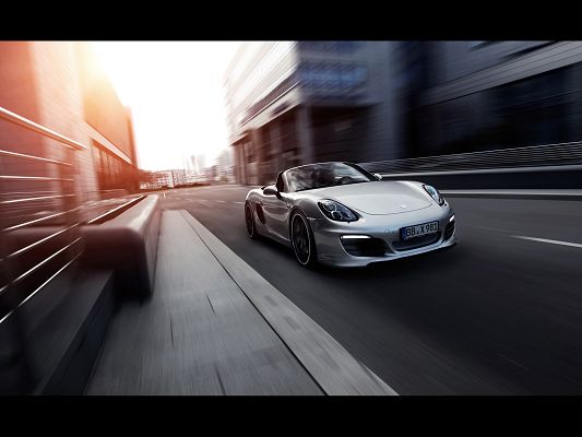 Post of Super Cars, Porsche Boxster on the Road, is Decent and Prosperous in Look