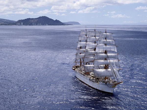 Charming Wallpaper Of A Schooner Sailing On The Sea