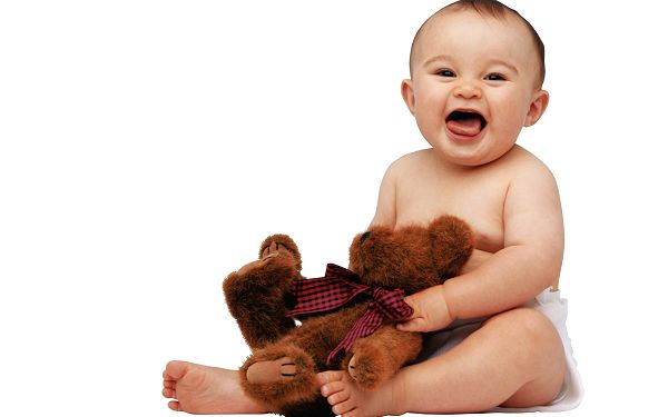 Free Wallpaper Of Baby: A Cute Baby Holding A Teddy Bear