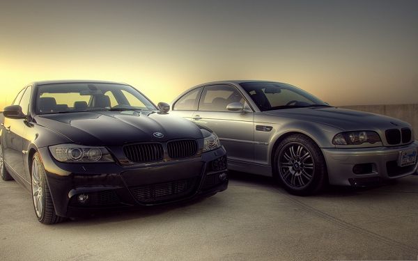 click to free download the wallpaper--BMW M3 Cars Background, Two Super Cars in the Stop, Generating Golden Light