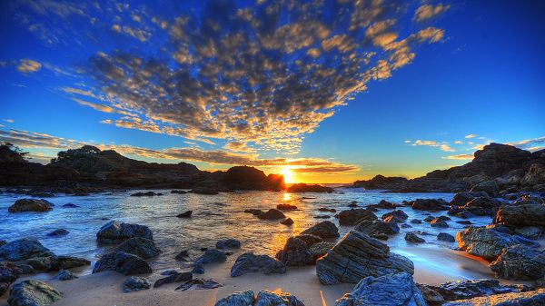 click to free download the wallpaper--Beautiful Sceneries of Nature - The Rising Sun, Gathering Thick Clouds, the Stony River, Looking Great