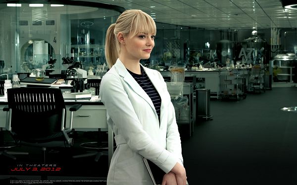 click to free download the wallpaper--Emma Stone as Gwen Stacy in 1680x1050 Pixel, Standing Upright and Smiling, She Shall Fit Multiple Devices - TV & Movies Wallpaper