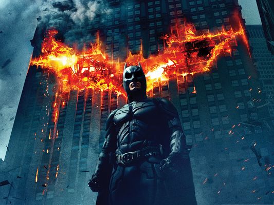 click to free download the wallpaper--Free 3D Movie Poster, Batman The Dark Knight, Firing Symbol Behind Him