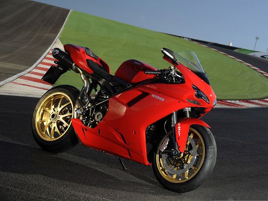 click to free download the wallpaper--Free Car Wallpapers, Ducati 1098 Superbike Next to Green Ground, Super Look