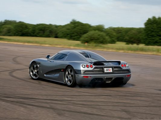 click to free download the wallpaper--Free Car Wallpapers, Koenigsegg CCX Among Nature Landscape, Rear And Side Look