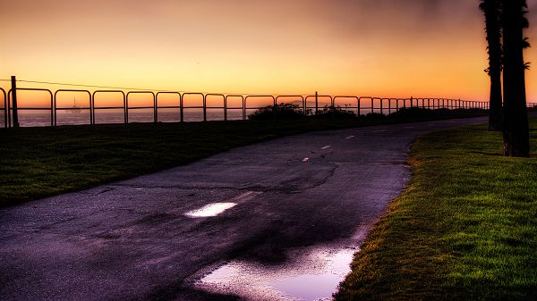 click to free download the wallpaper--Free Download Natural Scenery Picture - A Dark Road, the Setting Sun, Golden Horizon, Typical Dusk Scene
