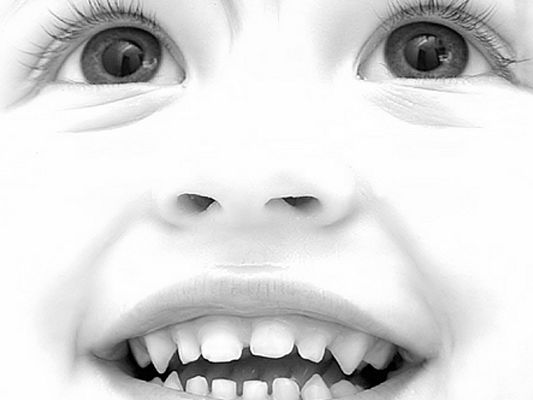 click to free download the wallpaper--Free Downloading Baby Wallpaper - Cute Baby Post in Black and White Style, He is Smiling and Thus Lovely