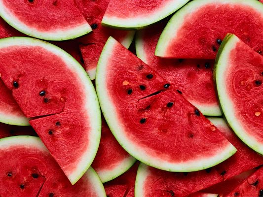 click to free download the wallpaper--Free Fruits Wallpaper, Sliced Watermelon, Red and Delicious
