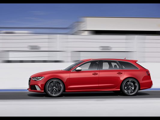 click to free download the wallpaper--Free Super Car Photos, Audi RS6 in Avant Side Motion, Incredible Speed, Scenes Are Running Behind