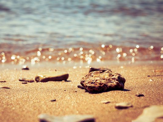 click to free download the wallpaper--Free Wallpaper Backgrounds, Beach Pebbles, Shinning Sand and Water