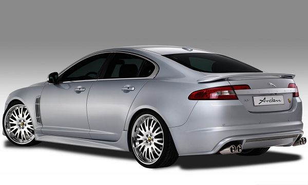 click to free download the wallpaper--Jaguar XF Arden Car, Gray Super Car About to Turn a Corner, Put on White Background