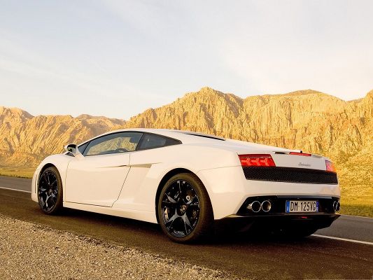 click to free download the wallpaper--Lamborghini Sport Cars, White and Decent Car on a Slope, Impressive Look