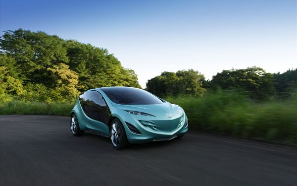 click to free download the wallpaper--Mazda Sky Concept 3 Post in Pixel of 1920x1200, Light Blue Car on the Move, Is It Ignorant of the Natural Scene? - HD Cars Wallpaper