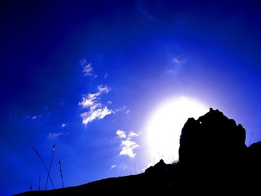 click to free download the wallpaper--Nature Landscape Pics, the Rising Sun, the Blue and Cloudless Sky, Black Stones