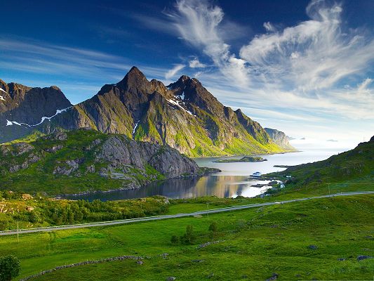 Nature Nordic Landscape, Tall Mountains and the Peaceful Sea, Green Grass Alongside