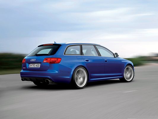 click to free download the wallpaper--Nice Cars Picture, Blue Audi RS6 Avant Car in Fast Speed, Under the Blue Sky