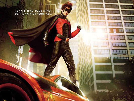 click to free download the wallpaper--RedMist Kick Ass Movie Post in 1600x1200 Pixel, Red Cape is Flying in the Wind, Standing on a Car, He is a Good Fit - TV & Movies Post