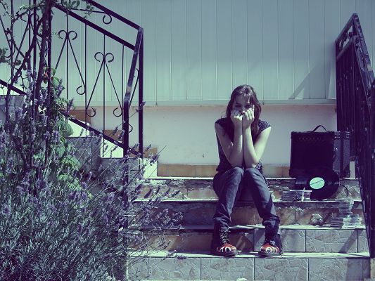 click to free download the wallpaper--Sad Girl Images, Sitting On Stairs, She is Crying with the Tape and CDs