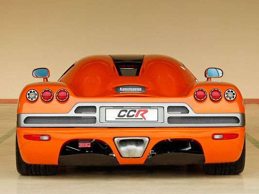 click to free download the wallpaper--Super Cars Wallpaper, Orange Koenigsegg CCR in Rear Look, Nice and Impressive