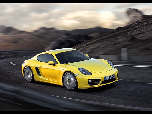 click to free download the wallpaper--Top Car Image of Porsche Cayman, Seen from Side Angle, Surrounding Scenes Tell It is in Fast Speed