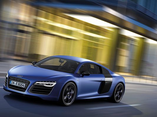 click to free download the wallpaper--World-Known Super Car Pics of Audi R8, a Blue Car in Great Speed, Along Scenes Rushing Behind