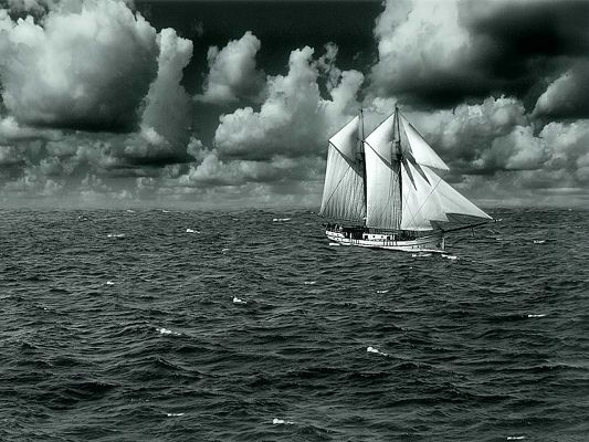 Free Wallpaper Of A Boat Sailing On The Sea