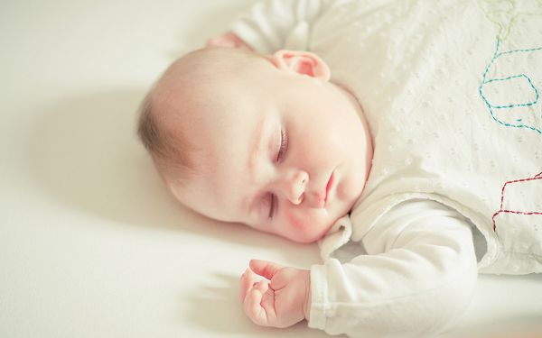 free wallpaper of baby - a sleeping baby ,click to download